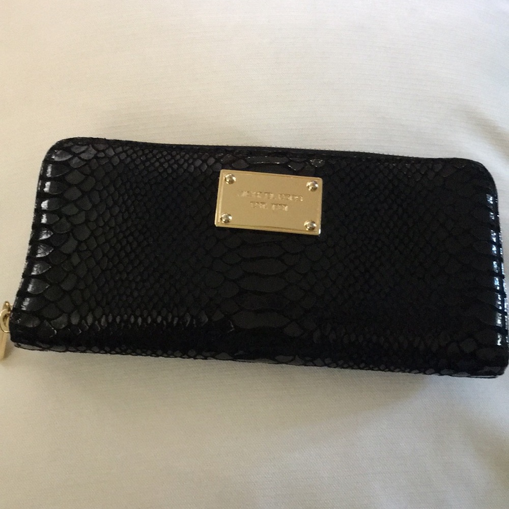 Michael Kors snake skin print wallet.